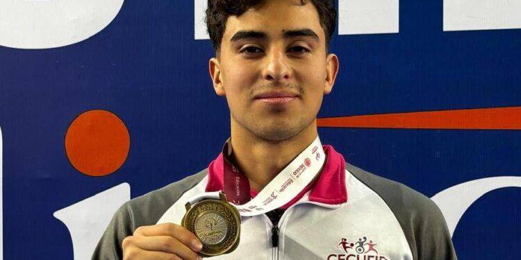 Oro para Michoacán en olimpiada nacional, en 100 metros mariposa 1 En tareas de investigación, FGE ejecuta cateo en Tarímbaro y recupera siete vehículos con reporte de robo y asegura 447 dosis de narcótico